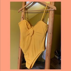 Yellow one piece bathing suit